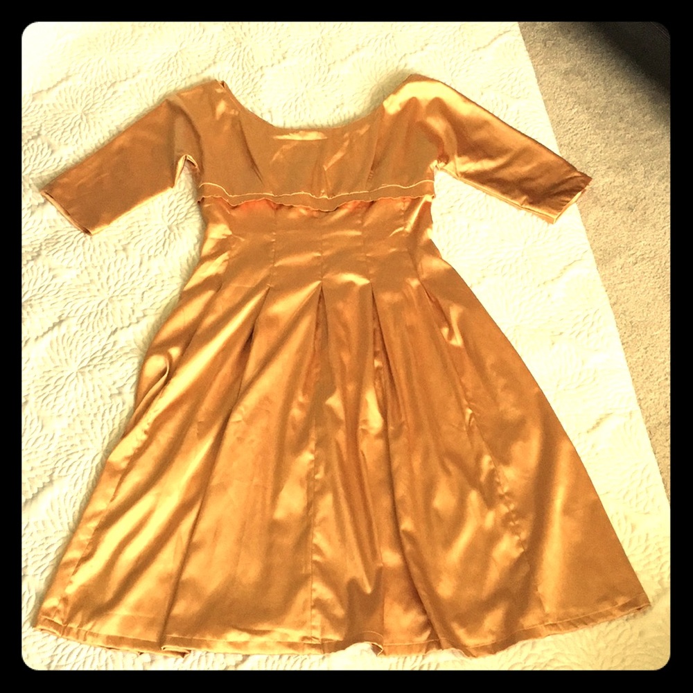NWT Gold Swing dress by Bettie Page